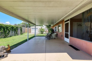 Flamingo house. Charming Floridian home, meticulously maintained on Jacaranda West Country Club in Florida - for sale on GolfHomes.com, golf home, golf lot
