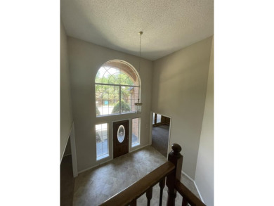 Entry includes a grand foyer with all new tile and double stair on The Courses at Watters Creek in Texas - for sale on GolfHomes.com, golf home, golf lot