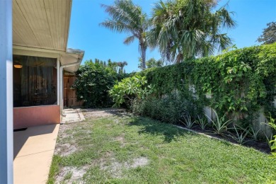 Flamingo house. Charming Floridian home, meticulously maintained on Jacaranda West Country Club in Florida - for sale on GolfHomes.com, golf home, golf lot