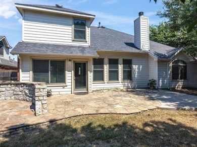 This spacious family home offers the perfect blend of comfort on Eagle Mountain Country Club  in Texas - for sale on GolfHomes.com, golf home, golf lot