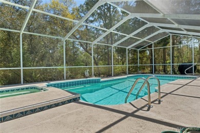 Tastefully renovated and meticulously maintained pool and spa on Sugarmill Woods Golf and Country Club in Florida - for sale on GolfHomes.com, golf home, golf lot