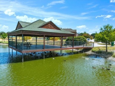 This spacious family home offers the perfect blend of comfort on Eagle Mountain Country Club  in Texas - for sale on GolfHomes.com, golf home, golf lot