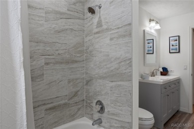 Tastefully renovated and meticulously maintained pool and spa on Sugarmill Woods Golf and Country Club in Florida - for sale on GolfHomes.com, golf home, golf lot