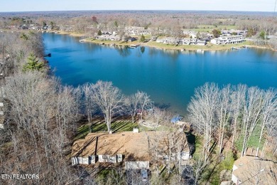 Looking for a peaceful lakefront home in a resort community? on Druid Hills Golf Club in Tennessee - for sale on GolfHomes.com, golf home, golf lot