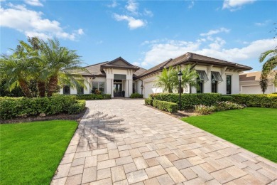 Step into a turnkey dream nestled in a prestigious GOLF on Ritz-Carlton Members Golf Club in Florida - for sale on GolfHomes.com, golf home, golf lot