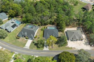 Tastefully renovated and meticulously maintained pool and spa on Sugarmill Woods Golf and Country Club in Florida - for sale on GolfHomes.com, golf home, golf lot
