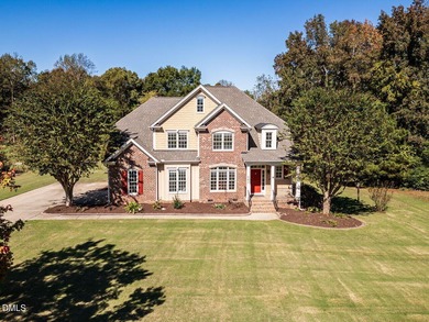 Custom-built home overlooking the 6th tee of Riverwood Golf on Riverwood Golf and Athletic Club in North Carolina - for sale on GolfHomes.com, golf home, golf lot