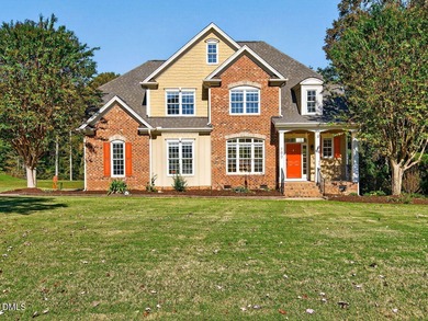 Custom-built home overlooking the 6th tee of Riverwood Golf on Riverwood Golf and Athletic Club in North Carolina - for sale on GolfHomes.com, golf home, golf lot