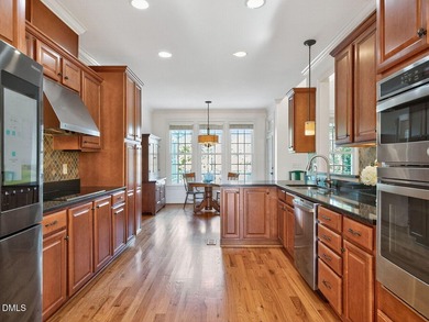Custom-built home overlooking the 6th tee of Riverwood Golf on Riverwood Golf and Athletic Club in North Carolina - for sale on GolfHomes.com, golf home, golf lot