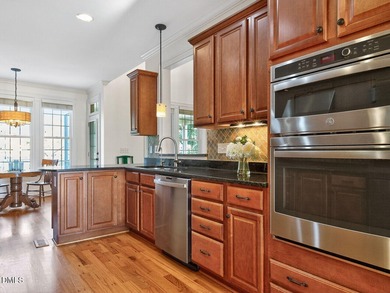 Custom-built home overlooking the 6th tee of Riverwood Golf on Riverwood Golf and Athletic Club in North Carolina - for sale on GolfHomes.com, golf home, golf lot