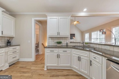 Welcome to your dream home in the prestigious Royal Lakes Golf & on Royal Lakes Golf and Country Club in Georgia - for sale on GolfHomes.com, golf home, golf lot