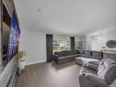 Tucked away on a quiet cul-de-sac and backing onto the lush on  in Florida - for sale on GolfHomes.com, golf home, golf lot