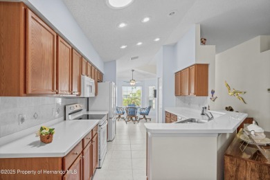 This immaculately maintained St. Andrews model is light and on Heritage Pines Country Club in Florida - for sale on GolfHomes.com, golf home, golf lot