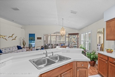 This immaculately maintained St. Andrews model is light and on Heritage Pines Country Club in Florida - for sale on GolfHomes.com, golf home, golf lot
