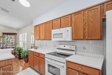 This immaculately maintained St. Andrews model is light and on Heritage Pines Country Club in Florida - for sale on GolfHomes.com, golf home, golf lot