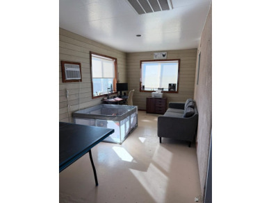 Enjoy this two-bedroom home with a detached two- car garage that on The Links At Coyote Wash in Arizona - for sale on GolfHomes.com, golf home, golf lot