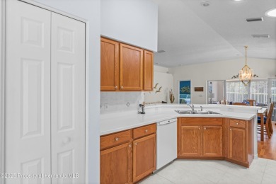 This immaculately maintained St. Andrews model is light and on Heritage Pines Country Club in Florida - for sale on GolfHomes.com, golf home, golf lot