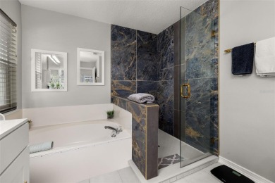Welcome to this stunning 2-story pool home with 4 bedrooms, 3 on Highlands Reserve Golf Club in Florida - for sale on GolfHomes.com, golf home, golf lot