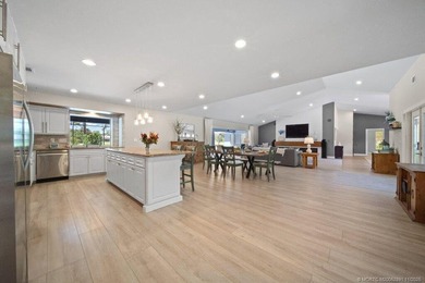 This 4BR/3BA CBS pool home sits on a private 1-acre cul-de-sac on Evergreen Club in Florida - for sale on GolfHomes.com, golf home, golf lot