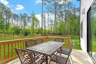 Nestled in the prestigious and sought-after Hasentree, lies the on Hasentree Club in North Carolina - for sale on GolfHomes.com, golf home, golf lot