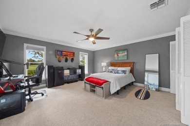 This 4BR/3BA CBS pool home sits on a private 1-acre cul-de-sac on Evergreen Club in Florida - for sale on GolfHomes.com, golf home, golf lot