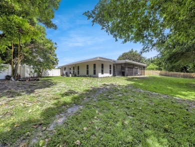 Tucked away on a quiet cul-de-sac and backing onto the lush on  in Florida - for sale on GolfHomes.com, golf home, golf lot