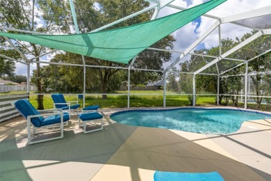Welcome to this stunning 2-story pool home with 4 bedrooms, 3 on Highlands Reserve Golf Club in Florida - for sale on GolfHomes.com, golf home, golf lot
