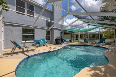 Welcome to this stunning 2-story pool home with 4 bedrooms, 3 on Highlands Reserve Golf Club in Florida - for sale on GolfHomes.com, golf home, golf lot