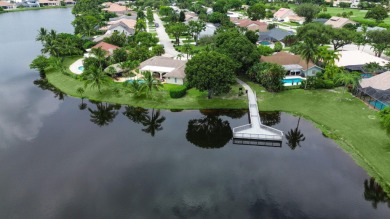 Tucked away on a quiet cul-de-sac and backing onto the lush on The Boca Country Club in Florida - for sale on GolfHomes.com, golf home, golf lot