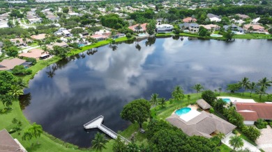 Tucked away on a quiet cul-de-sac and backing onto the lush on The Boca Country Club in Florida - for sale on GolfHomes.com, golf home, golf lot