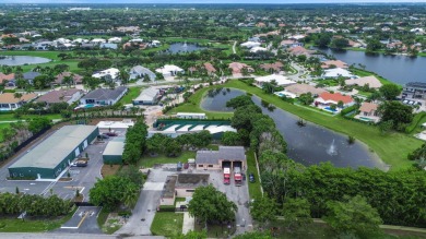 Tucked away on a quiet cul-de-sac and backing onto the lush on The Boca Country Club in Florida - for sale on GolfHomes.com, golf home, golf lot