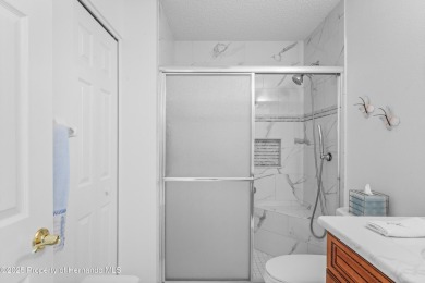 This immaculately maintained St. Andrews model is light and on Heritage Pines Country Club in Florida - for sale on GolfHomes.com, golf home, golf lot