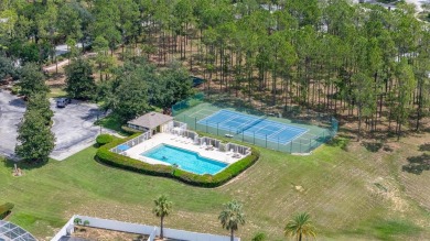 Welcome to this stunning 2-story pool home with 4 bedrooms, 3 on Highlands Reserve Golf Club in Florida - for sale on GolfHomes.com, golf home, golf lot