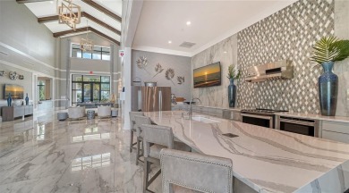 Discover the perfect blend of luxury and comfort in this on Lakewood National Golf Club in Florida - for sale on GolfHomes.com, golf home, golf lot