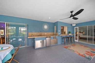 This 4BR/3BA CBS pool home sits on a private 1-acre cul-de-sac on Evergreen Club in Florida - for sale on GolfHomes.com, golf home, golf lot