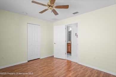 This immaculately maintained St. Andrews model is light and on Heritage Pines Country Club in Florida - for sale on GolfHomes.com, golf home, golf lot