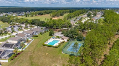 Welcome to this stunning 2-story pool home with 4 bedrooms, 3 on Highlands Reserve Golf Club in Florida - for sale on GolfHomes.com, golf home, golf lot