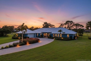 This 4BR/3BA CBS pool home sits on a private 1-acre cul-de-sac on Evergreen Club in Florida - for sale on GolfHomes.com, golf home, golf lot