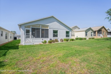 This immaculately maintained St. Andrews model is light and on Heritage Pines Country Club in Florida - for sale on GolfHomes.com, golf home, golf lot