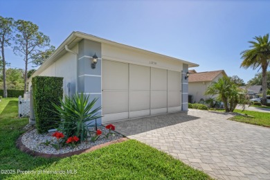 This immaculately maintained St. Andrews model is light and on Heritage Pines Country Club in Florida - for sale on GolfHomes.com, golf home, golf lot