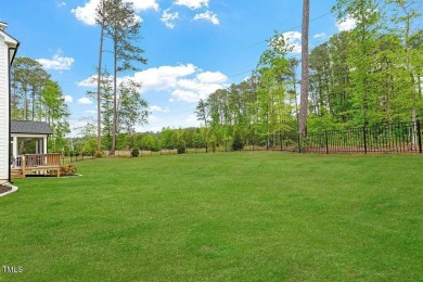 Nestled in the prestigious and sought-after Hasentree, lies the on Hasentree Club in North Carolina - for sale on GolfHomes.com, golf home, golf lot