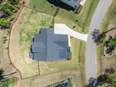 Nestled in the prestigious and sought-after Hasentree, lies the on Hasentree Club in North Carolina - for sale on GolfHomes.com, golf home, golf lot