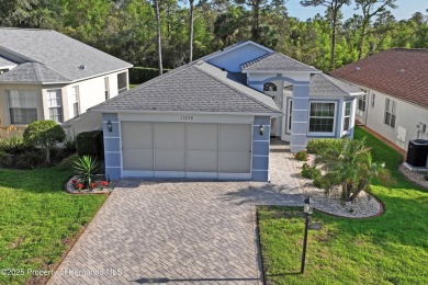 This immaculately maintained St. Andrews model is light and on Heritage Pines Country Club in Florida - for sale on GolfHomes.com, golf home, golf lot