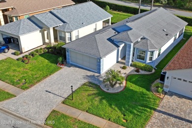 This immaculately maintained St. Andrews model is light and on Heritage Pines Country Club in Florida - for sale on GolfHomes.com, golf home, golf lot