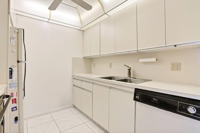 REDUCED TO SELL. LOCATION, LOCATION, LOCATION IS STILL AN on Wynmoor Golf Course in Florida - for sale on GolfHomes.com, golf home, golf lot