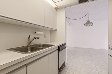 REDUCED TO SELL. LOCATION, LOCATION, LOCATION IS STILL AN on Wynmoor Golf Course in Florida - for sale on GolfHomes.com, golf home, golf lot