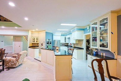 Experience luxury living in this exceptional custom-built brick on Myrtlewood Golf Course and Club  in South Carolina - for sale on GolfHomes.com, golf home, golf lot