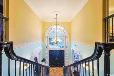 Experience luxury living in this exceptional custom-built brick on Myrtlewood Golf Course and Club  in South Carolina - for sale on GolfHomes.com, golf home, golf lot