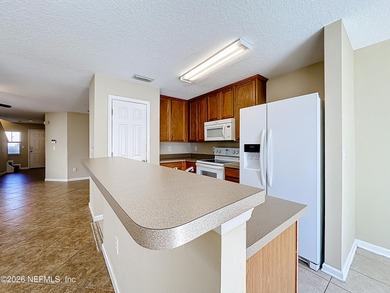 Location, lifestyle, and space come together in this spacious on Golf Club At Fleming Island in Florida - for sale on GolfHomes.com, golf home, golf lot