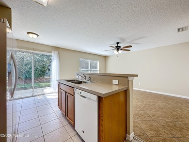 Location, lifestyle, and space come together in this spacious on Golf Club At Fleming Island in Florida - for sale on GolfHomes.com, golf home, golf lot